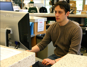 Iraq war veteran Niccola DeVereaux works at the information desk in the campus bookstore, April 7, 2009.  ()