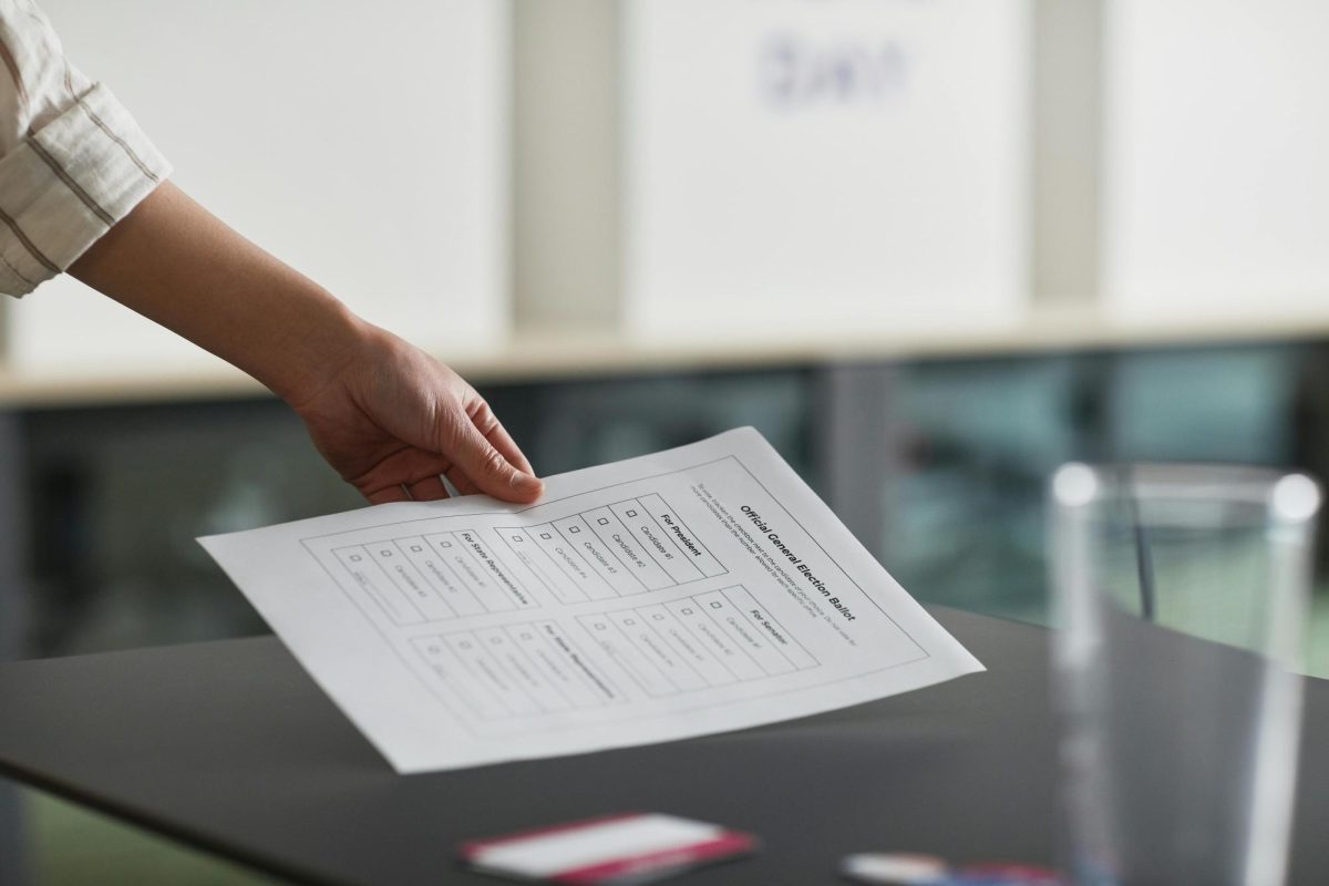 Photo by Edmond Dantès: https://www.pexels.com/photo/a-person-holding-a-voting-ballot-paper-7103079/