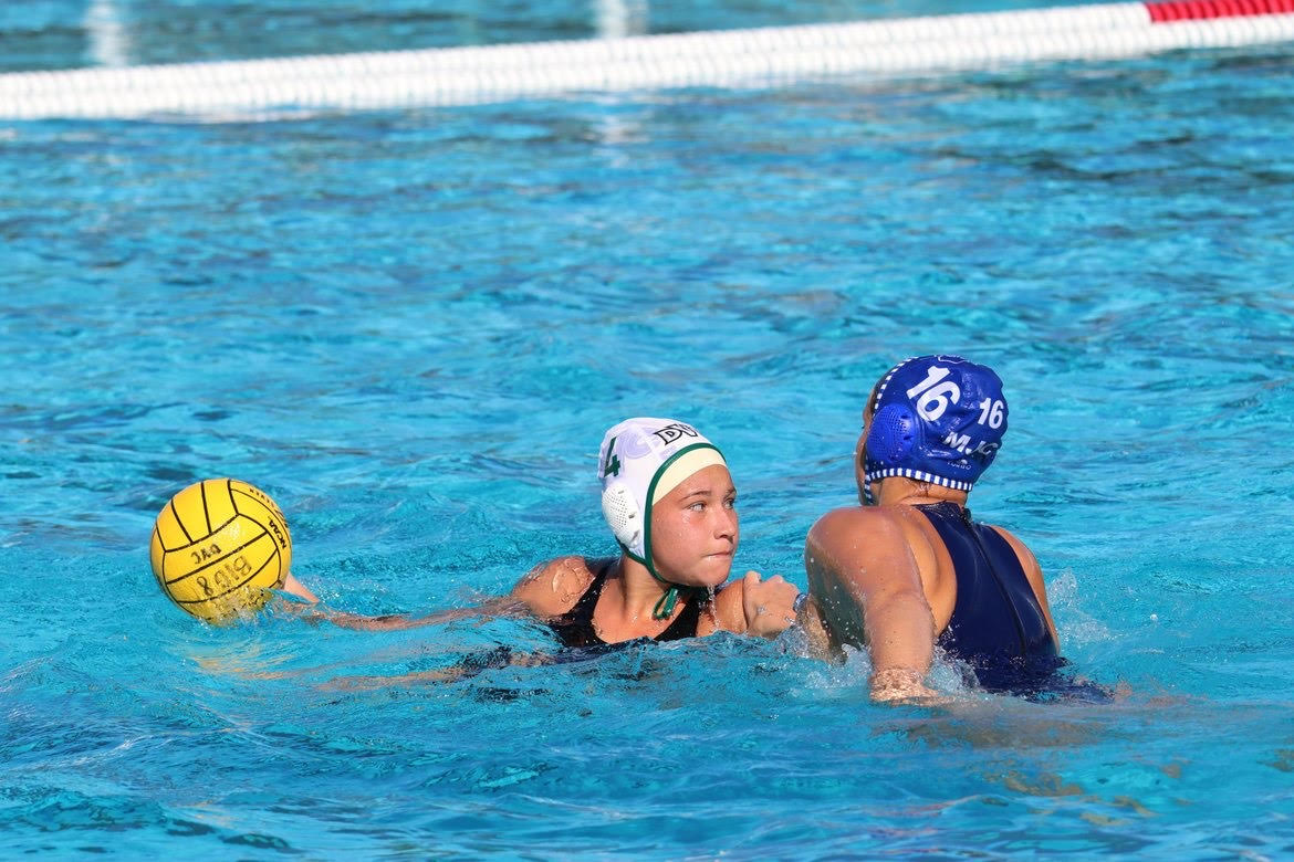 Photo by Lee Ward. 
Women’s Water Polo captain Sofia Goodson takes aim during a Big 8 Conference game against Modesto Junior College. Goodson helped establish a lead over Modesto going into halftime and took the final winning shot in overtime.